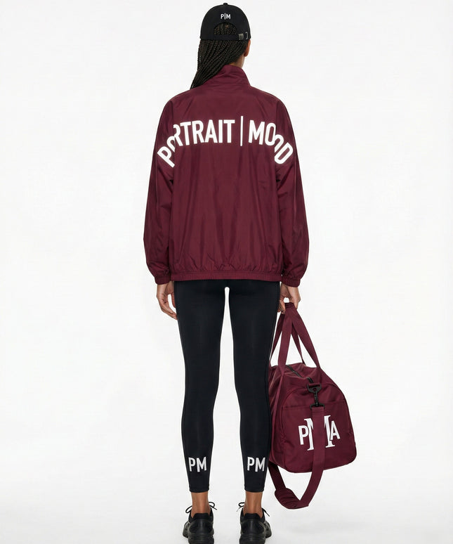 THE PMA ESSENTIAL BURGUNDY DUFFEL BAG