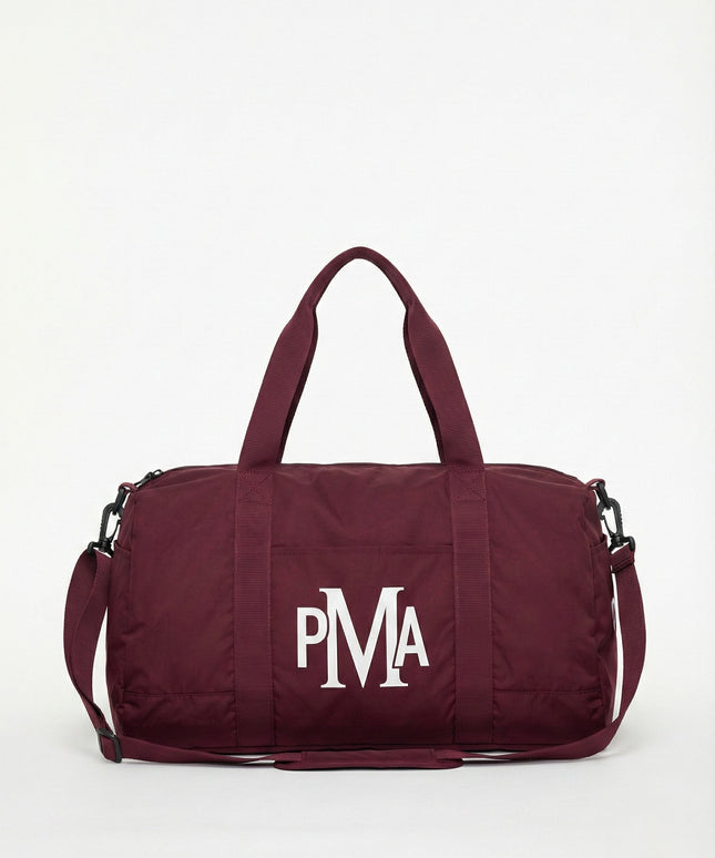 THE PMA ESSENTIAL BURGUNDY DUFFEL BAG