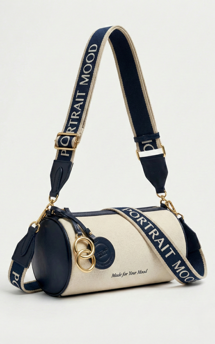 The P|M Cylinder Script Barrel Bag - Navy & Cream Edition