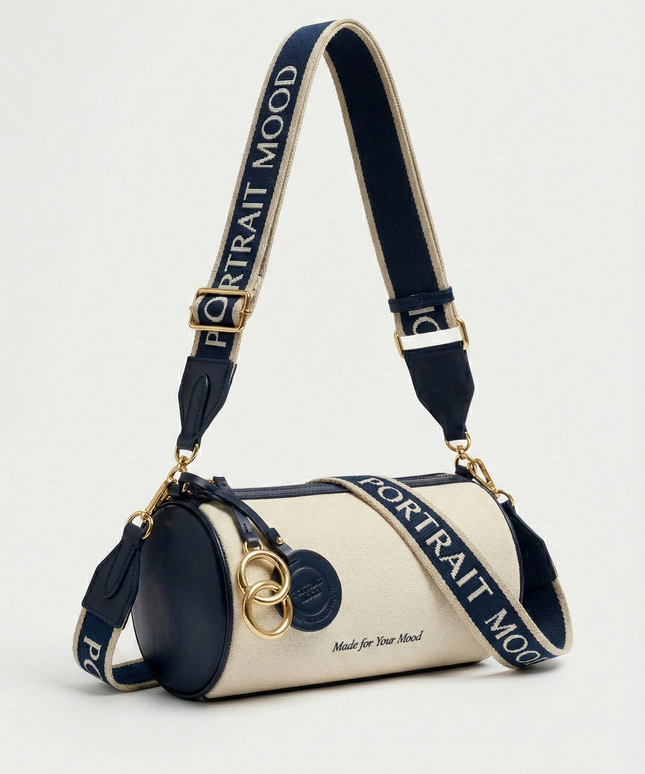 The P|M Cylinder Script Barrel Bag - Navy & Cream Edition