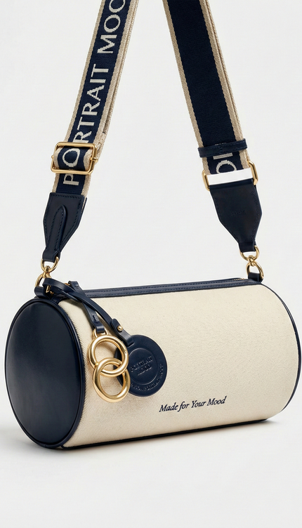 The P|M Cylinder Script Barrel Bag - Navy & Cream Edition