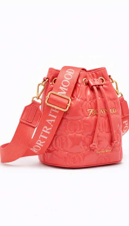 Gemini said The P|M Aura Quilted Bucket - Coral Patent Today's Mood Edition