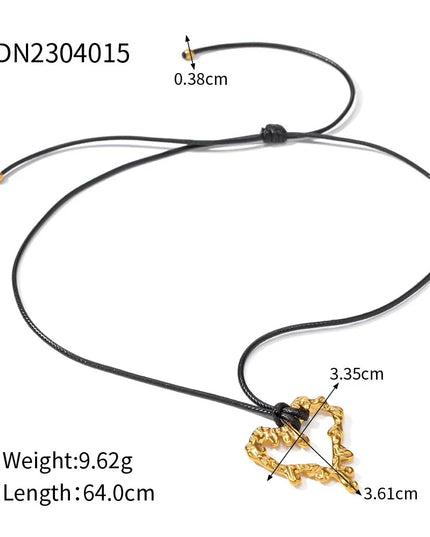 SCULPTED HEART CHARM NECKLACE
