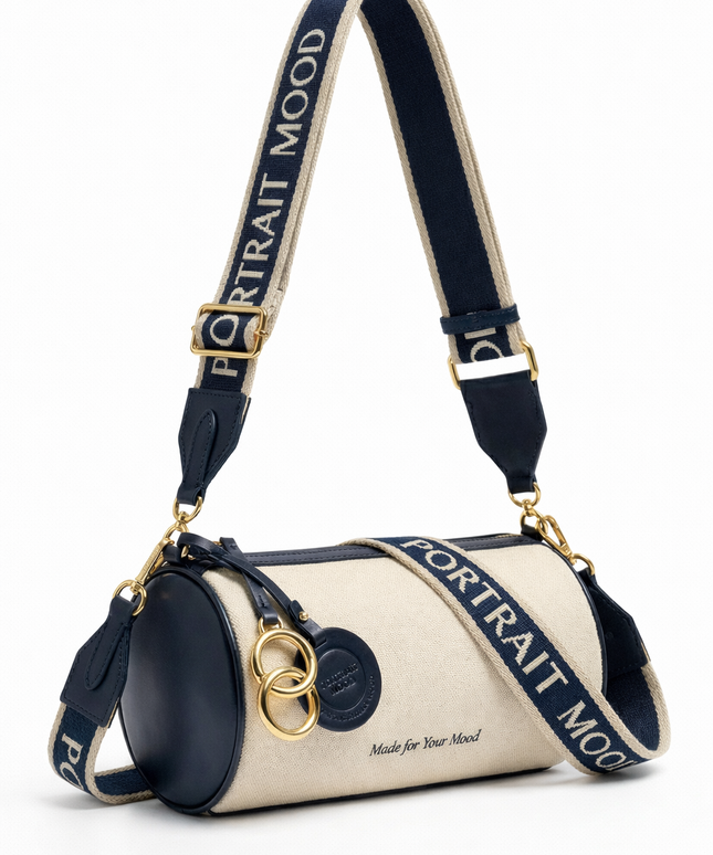 The P|M Cylinder Script Barrel Bag - Navy & Cream Edition