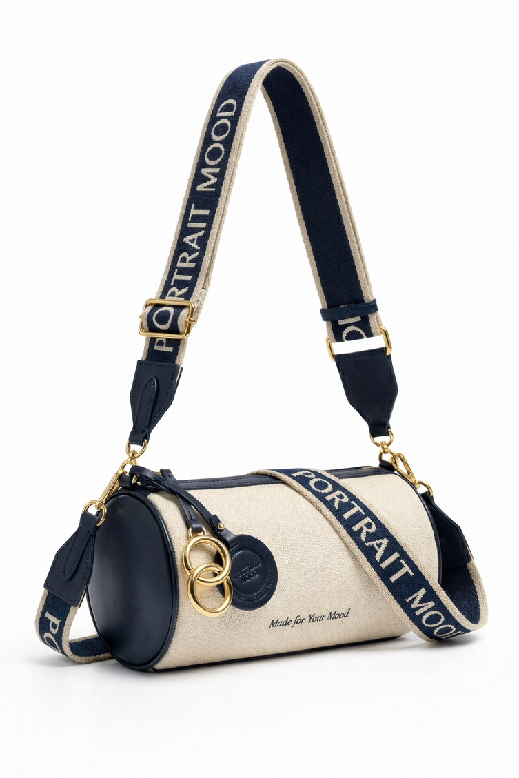 The P|M Cylinder Script Barrel Bag - Navy & Cream Edition