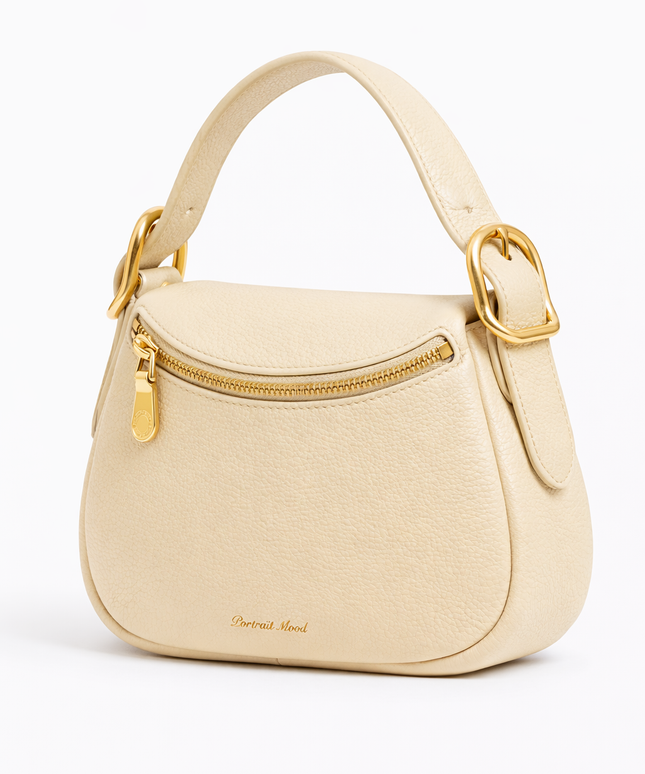 The P M Contour Saddle Bag Ivory Edition