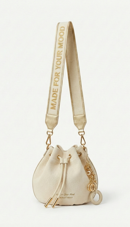 The P|M Aura Script Bucket Bag - White & Gold Edition