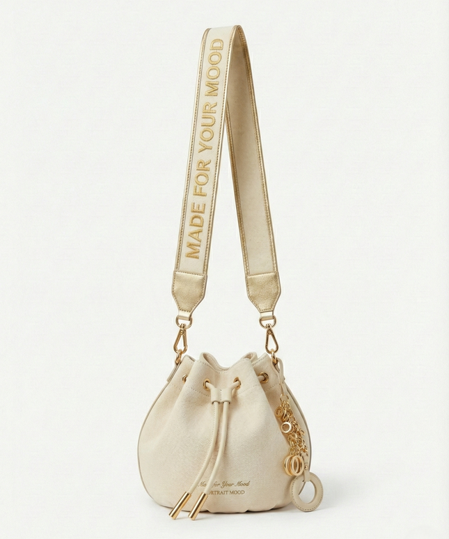 The P|M Aura Script Bucket Bag - White & Gold Edition