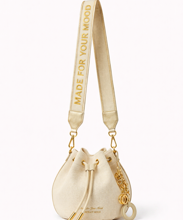 The P|M Aura Script Bucket Bag - White & Gold Edition