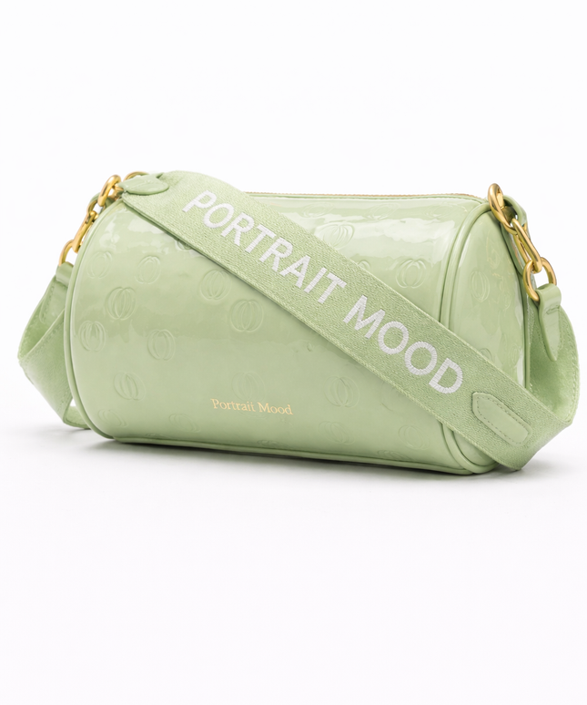 The P|M Aura Cylinder Bag - Pistachio Patent Today's Mood Edition