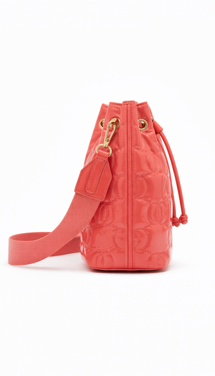 Gemini said The P|M Aura Quilted Bucket - Coral Patent Today's Mood Edition