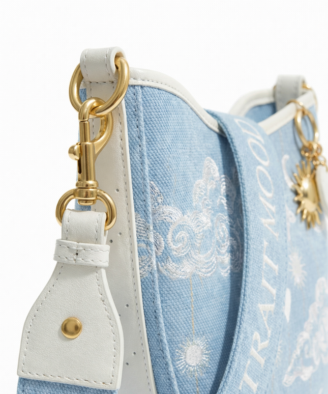 The P|M Horizon Crescent Shoulder Bag - Céleste Toile Edition