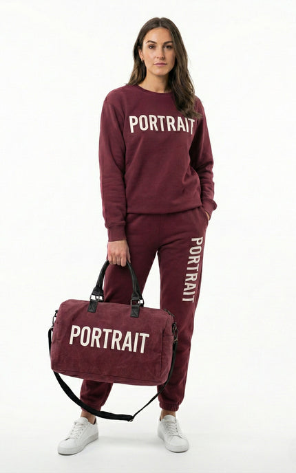 THE PORTRAIT VOYAGER DUFFEL – Burgundy Edition