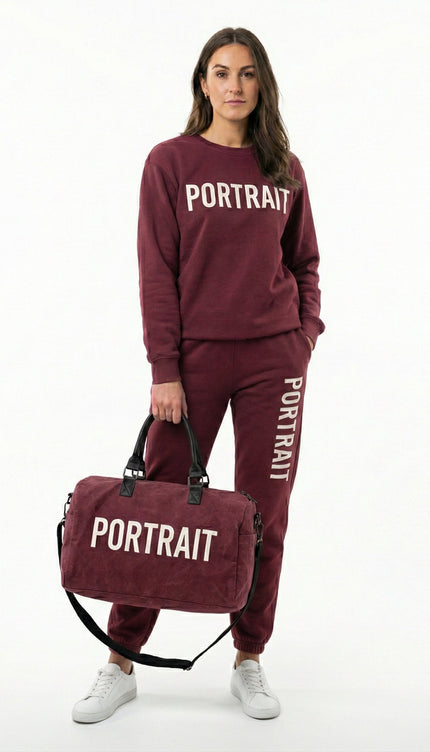 THE PORTRAIT VOYAGER DUFFEL – Burgundy Edition