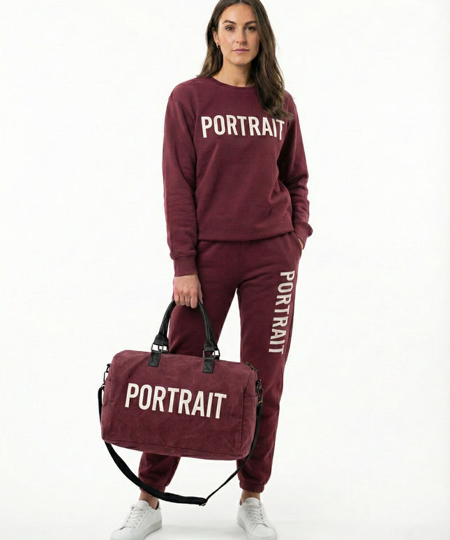 THE PORTRAIT VOYAGER DUFFEL – Burgundy Edition