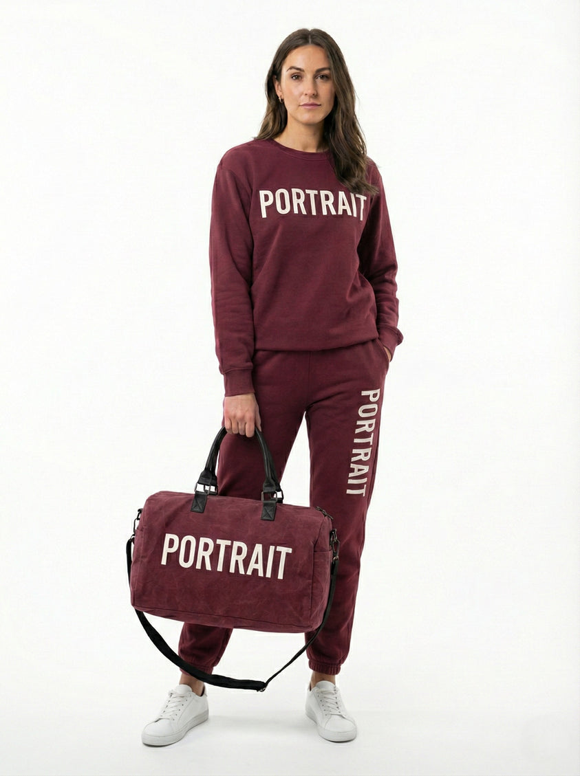 THE PORTRAIT VOYAGER DUFFEL – Burgundy Edition