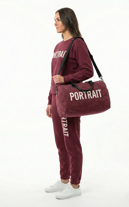 THE PORTRAIT VOYAGER DUFFEL – Burgundy Edition